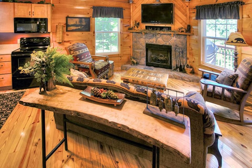 Beautifully decorated main floor living area with gas fireplace and flat screen TV