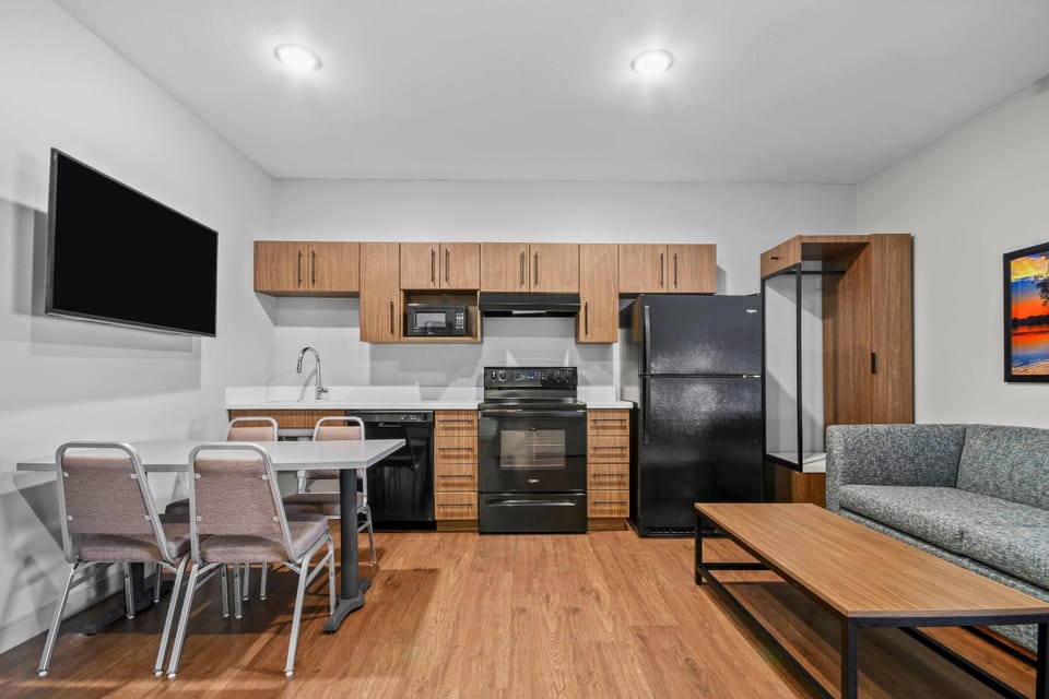 Room, 1 Queen Bed, Non Smoking, Kitchen | Pillowtop beds, desk, laptop workspace, blackout drapes