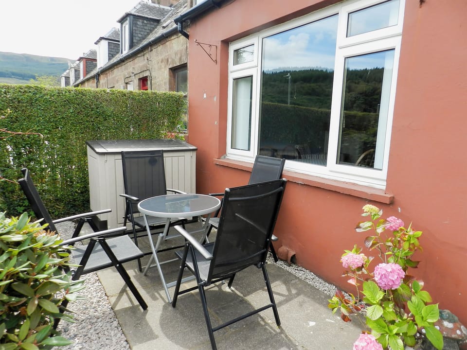 Patio to the front with furniture | Sunnyside Cottage, Lamlash, Isle of Arran