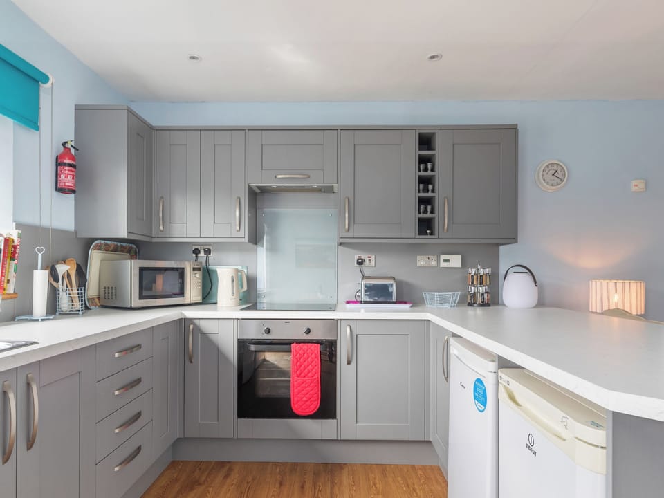 Kitchen area | Min y Traeth (By the Beach), Morfa Nefyn, near LLyn Peninsula