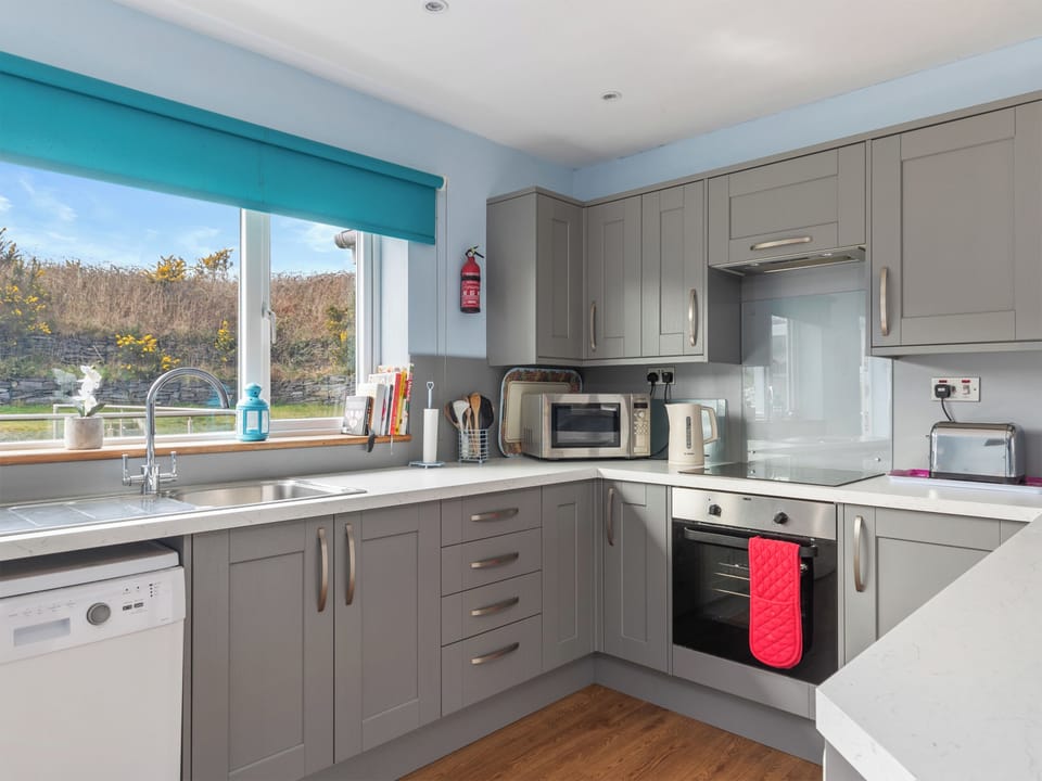 Kitchen area | Min y Traeth (By the Beach), Morfa Nefyn, near LLyn Peninsula