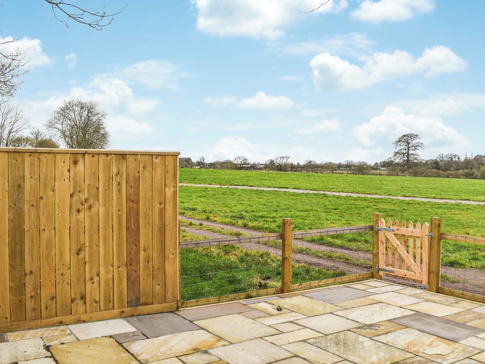 Patio | Langston Farm Chalet, Okeford Fitzpaine, near Blandford Forum