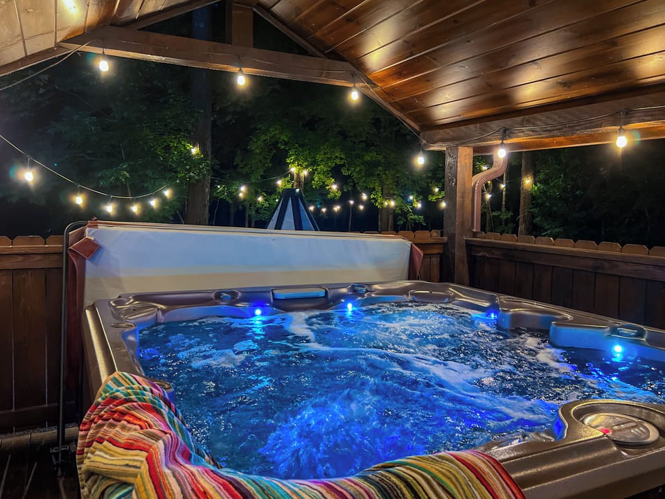 Soak in a sanctuary of blue light and towering pines for ultimate relaxation.