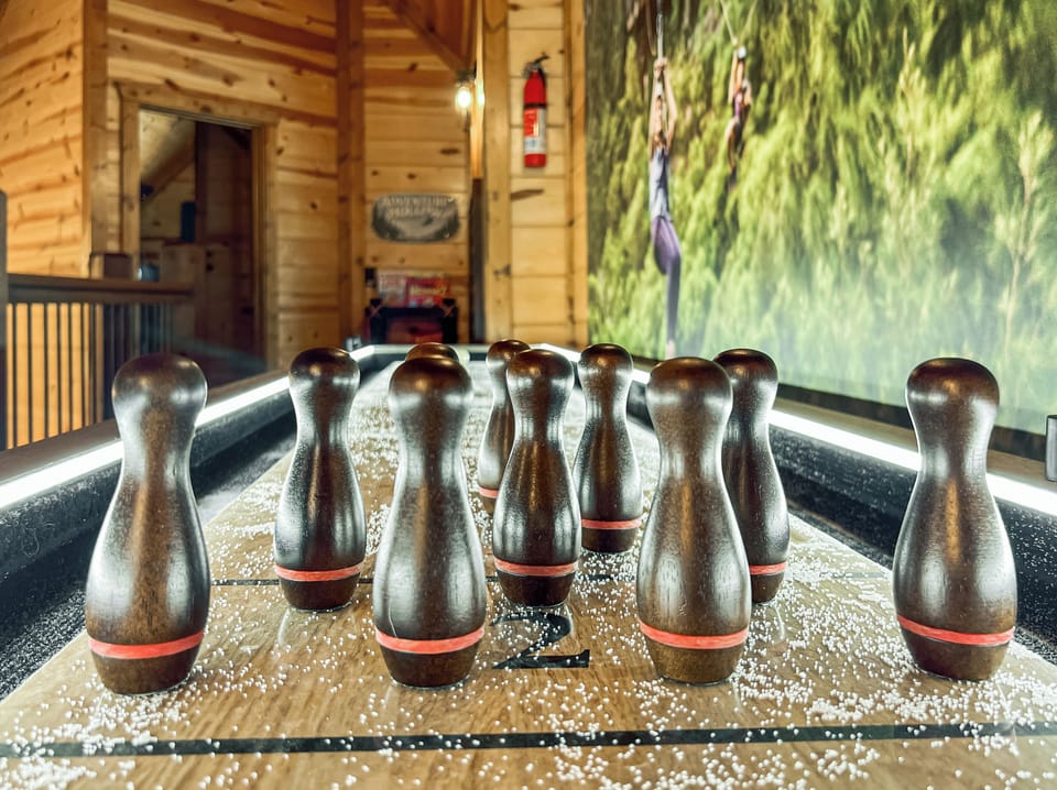 Connect with loved ones with a friendly bowling game on the shuffle board table.