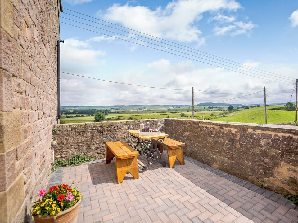 Sitting-out-area | Farmside Cottage - Wandon Farm Cottages, Chatton, near Wooler