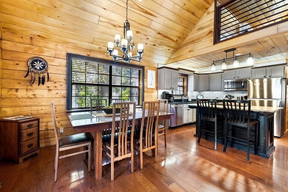 Dining area next to kitchen. Seating at bar