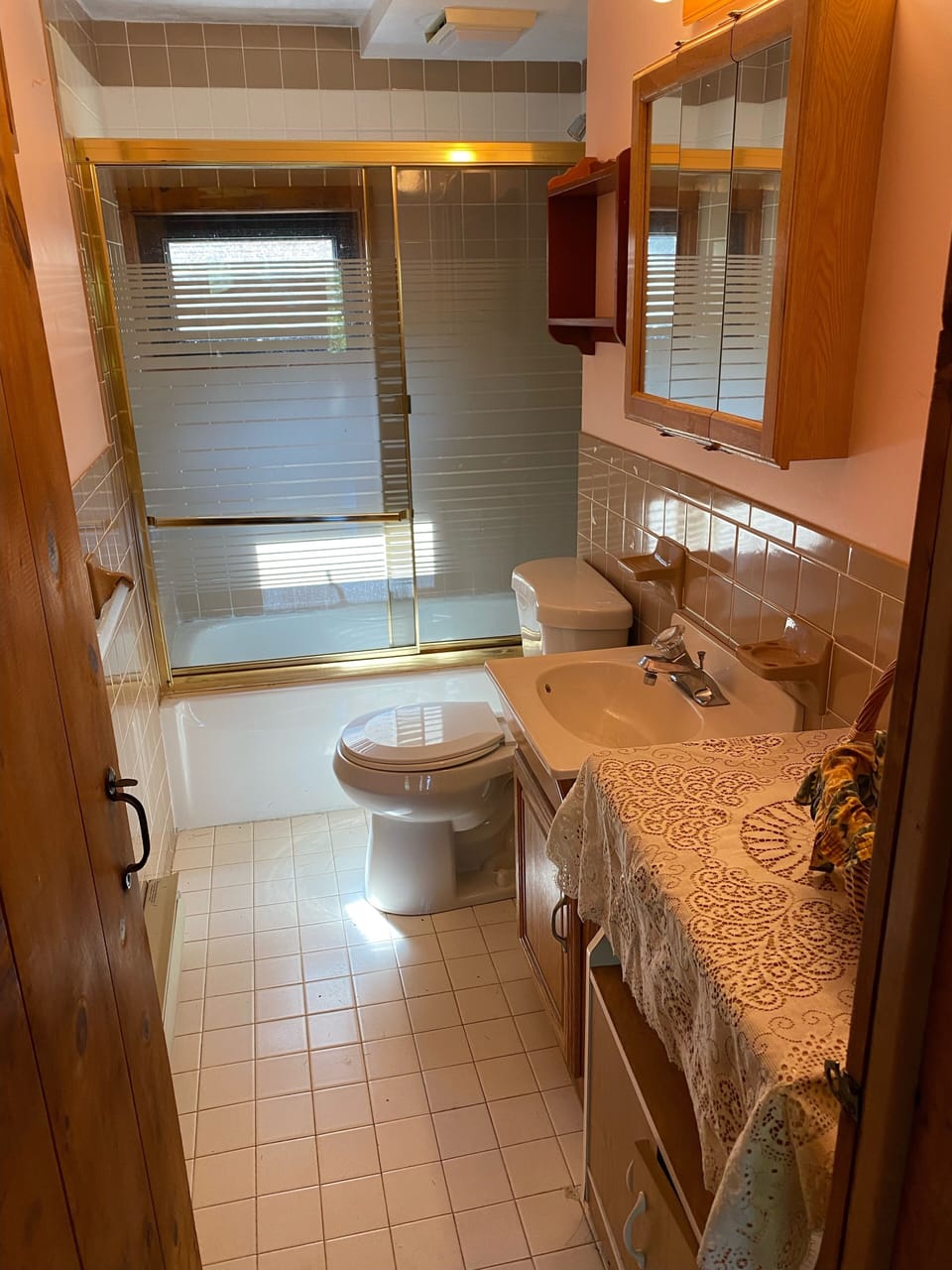 Shower, Bath, Sink, Toilet and vanity.