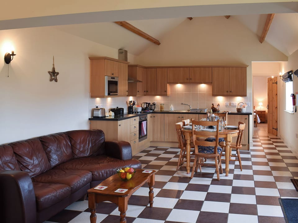 Tile-floored open plan living area | Betty&rsquo;s Byre - Cleveland View Cottages, Easby Grange, near Great Ayton