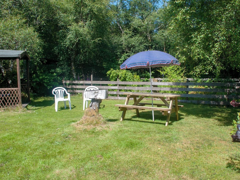 Spacious lawned garden | Taigh Mhairi, Portree, Isle of Skye