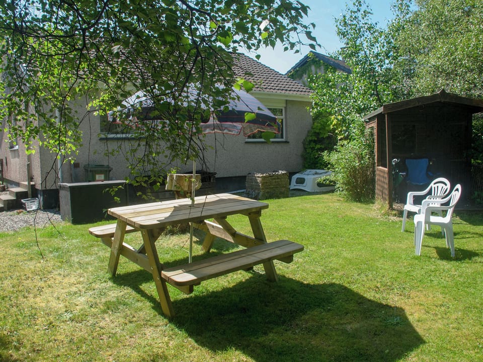 Sitting out area int he garden | Taigh Mhairi, Portree, Isle of Skye