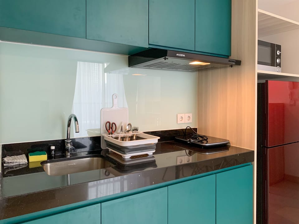 Apartment, 2 Bedrooms | Private kitchen | Fridge, electric kettle, cookware/dishes/utensils, dining tables