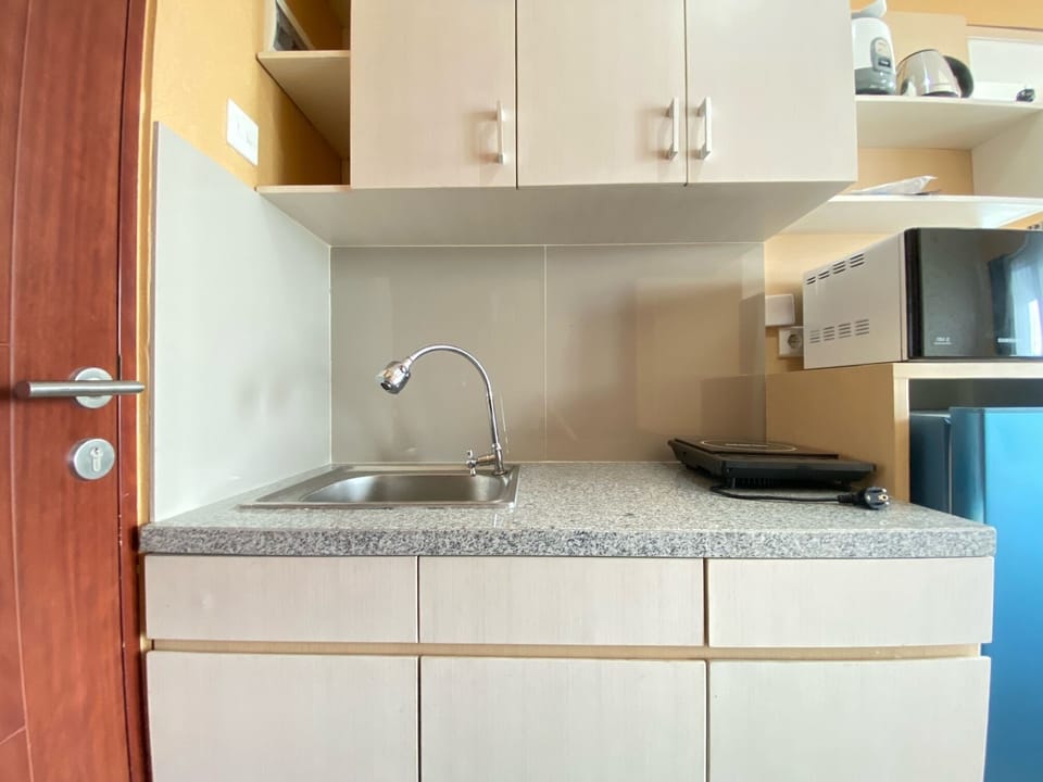 Apartment | Private kitchen | Fridge, stovetop, cookware/dishes/utensils