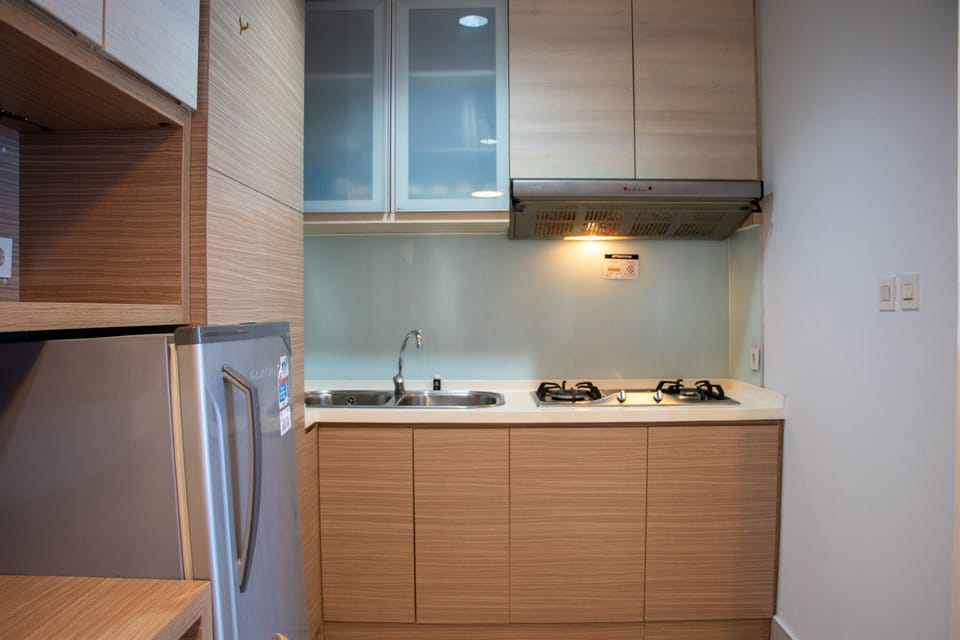 Apartment, 2 Bedrooms | Private kitchen | Fridge, stovetop, cookware/dishes/utensils, dining tables