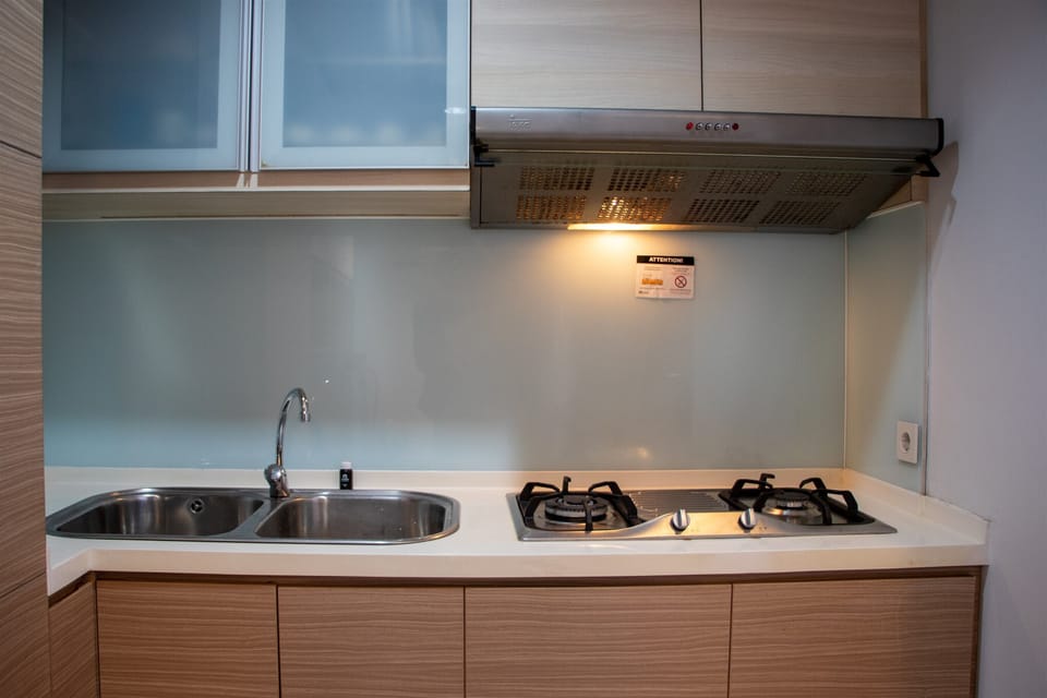 Apartment, 2 Bedrooms | Private kitchen | Fridge, stovetop, cookware/dishes/utensils, dining tables
