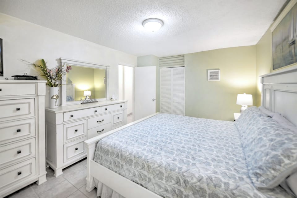 Peaceful private bedroom with crisp linens