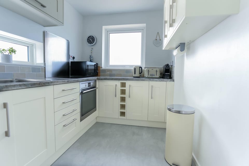 Panoramic Apartment, Private Bathroom, Sea View | Shared kitchen
