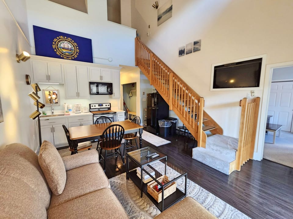 Living area with bedroom to right