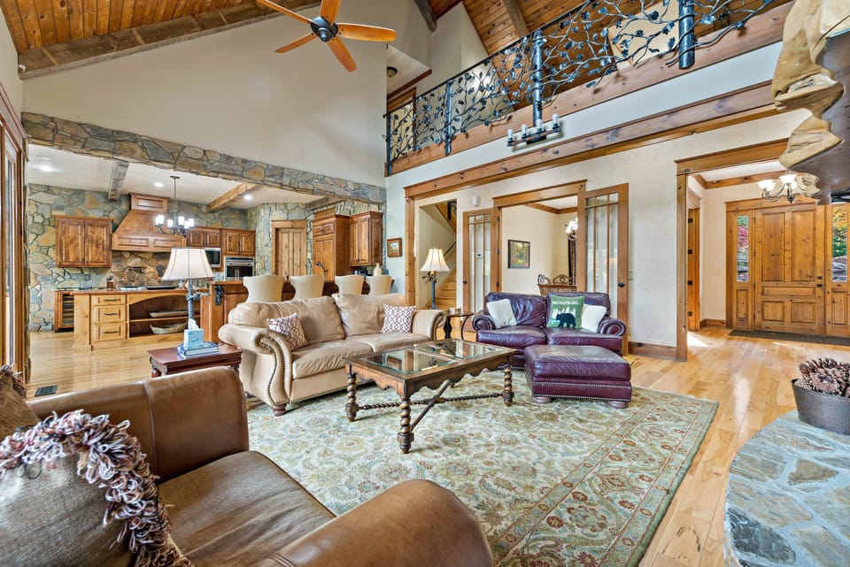 Main living room with TV for streaming and gas log fireplace