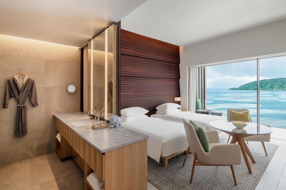 Twin Seaview Room (High Floor) | Minibar, in-room safe, individually decorated, desk