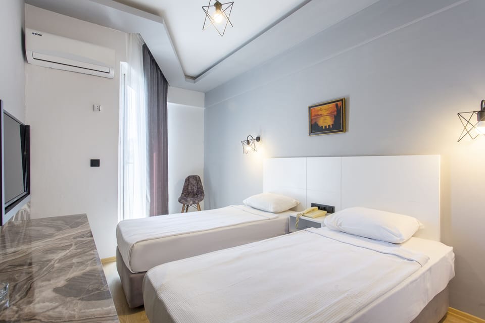 Premium bedding, free minibar, desk, soundproofing
