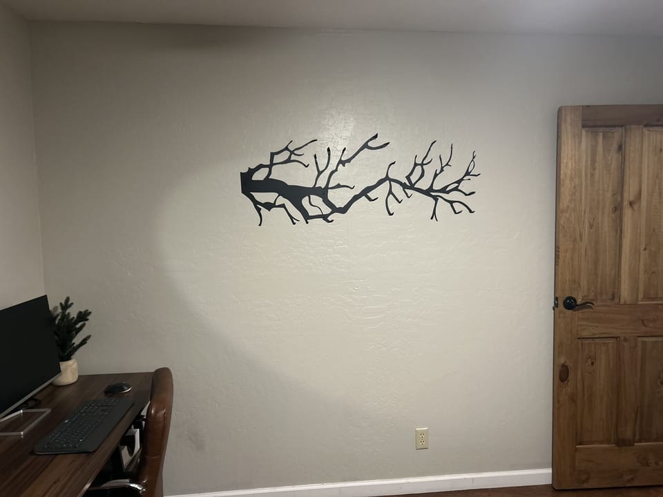 Hang your coats, hats and scarves on this charming rack in the guest room