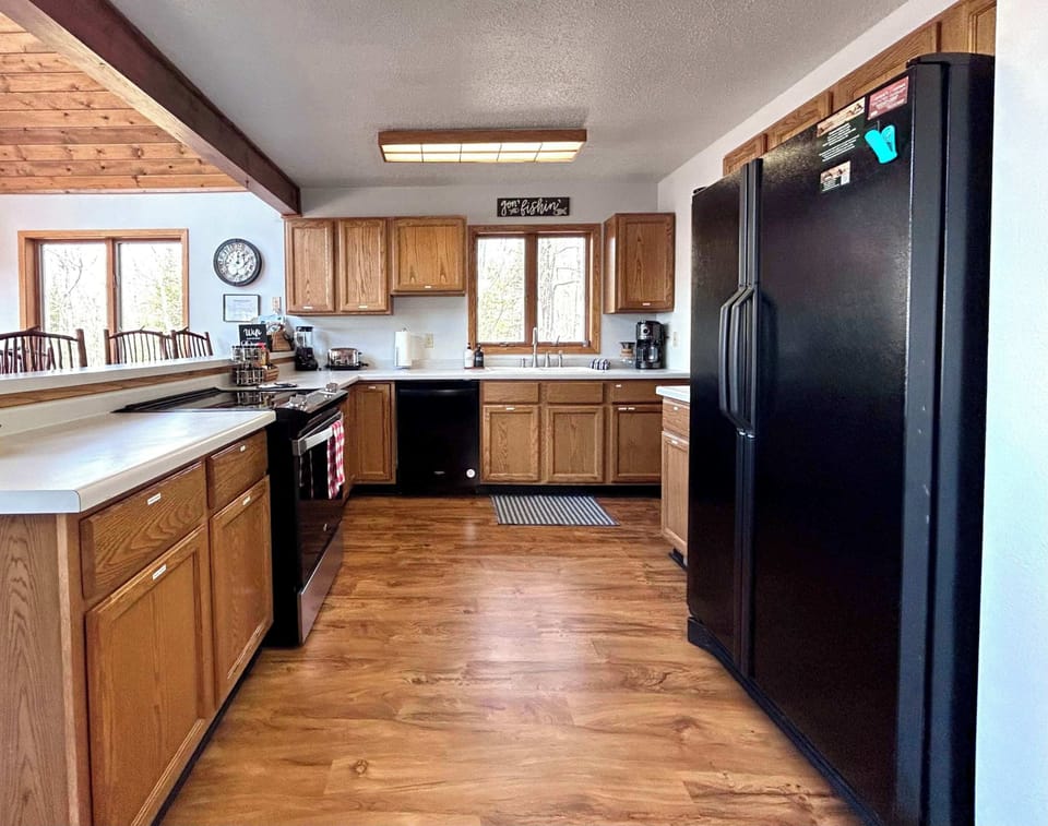 Our fully stocked kitchen has everything you need to enjoy a summer BBQ or warm up with soup at riding snowmobiles!