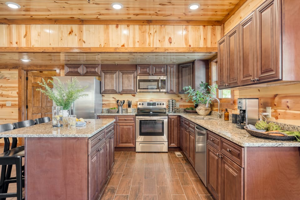 Spacious kitchen with modern appliances.