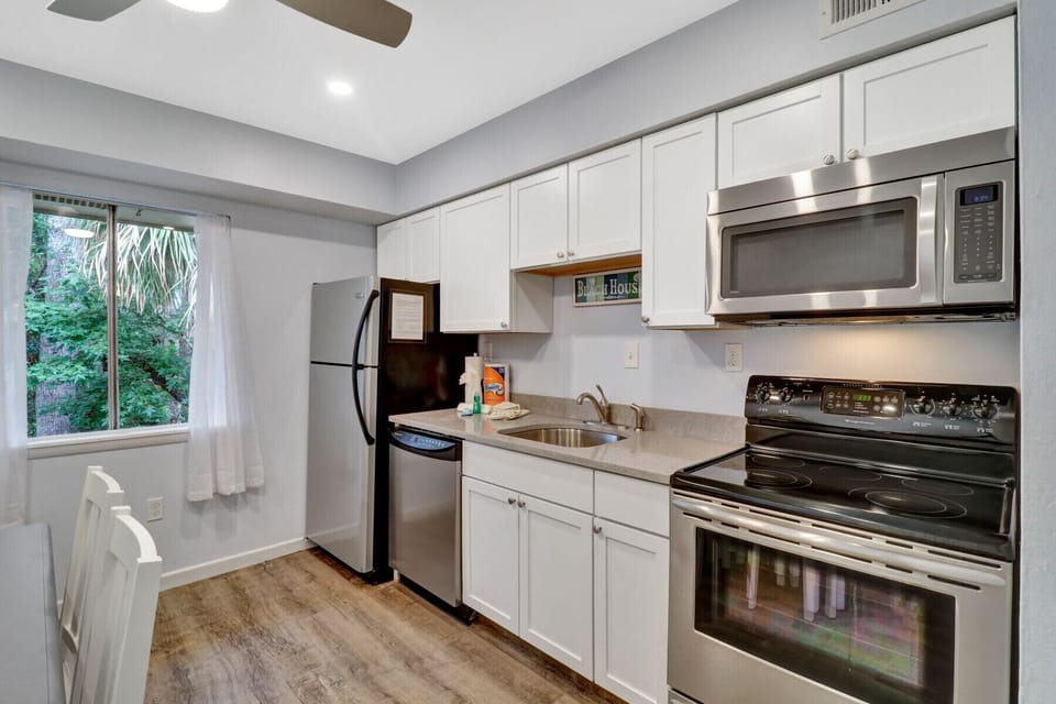 Full sized stainless steel appliances with Keurig and drip coffee pot available