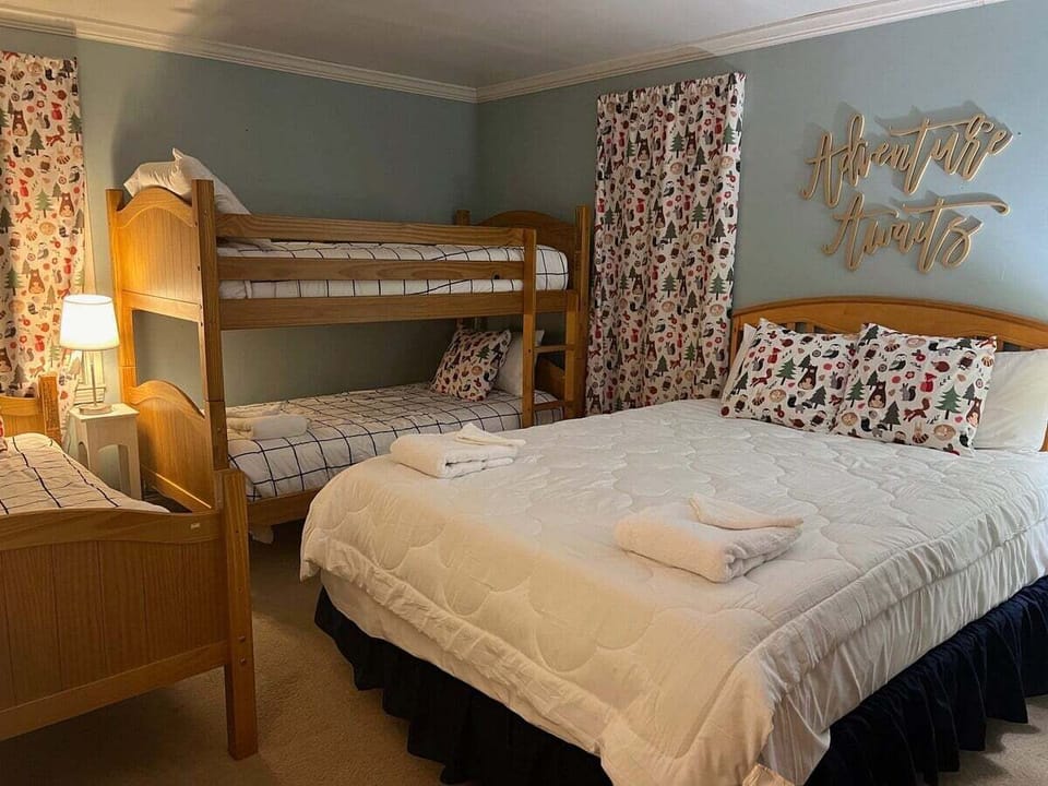 Adventure Awaits in this Lower Level Bunk Room
