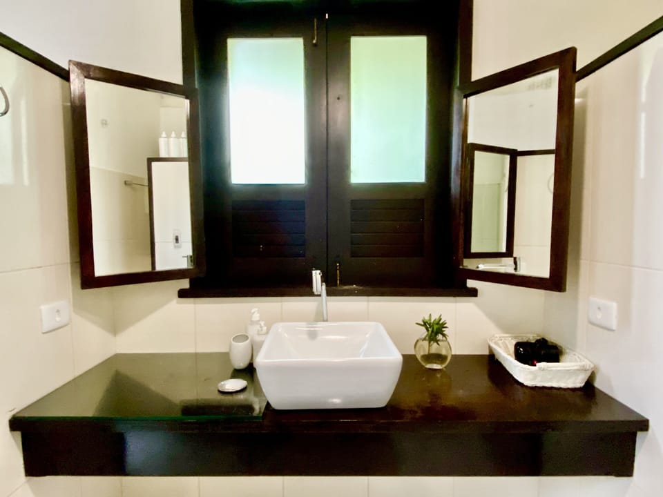Classic Triple Room, Garden Area | Bathroom | Shower, rainfall showerhead, designer toiletries, hair dryer