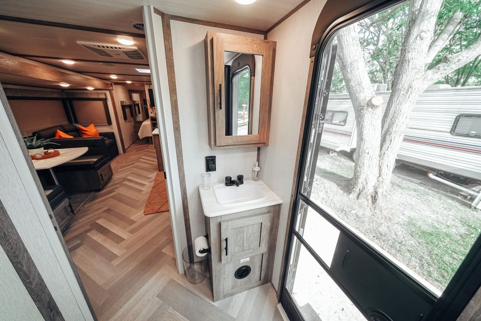 Bathroom has a second entry door for easy access while sitting outside
