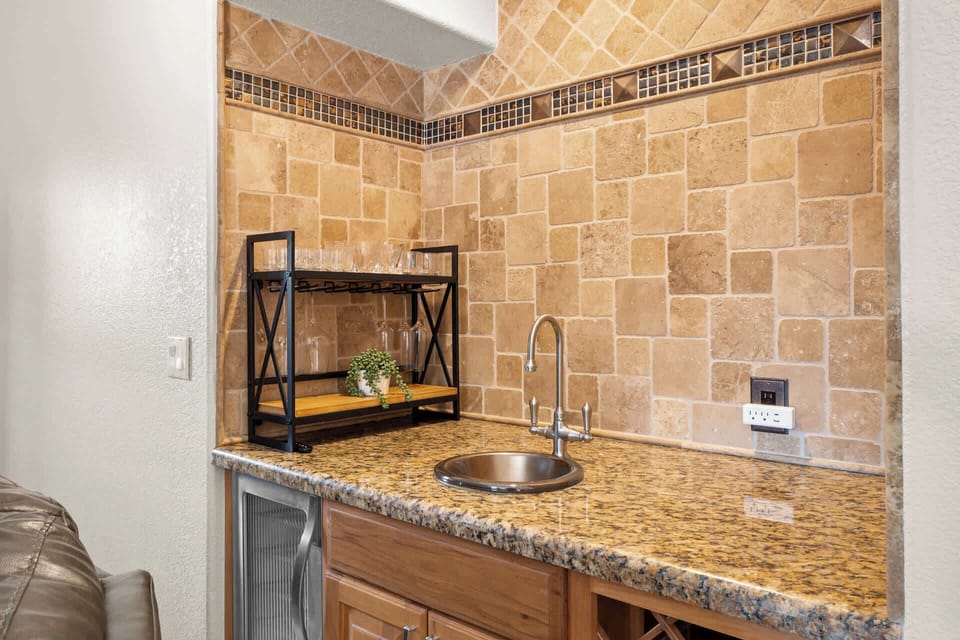 This wet bar is perfect for preparing your evening cocktails.