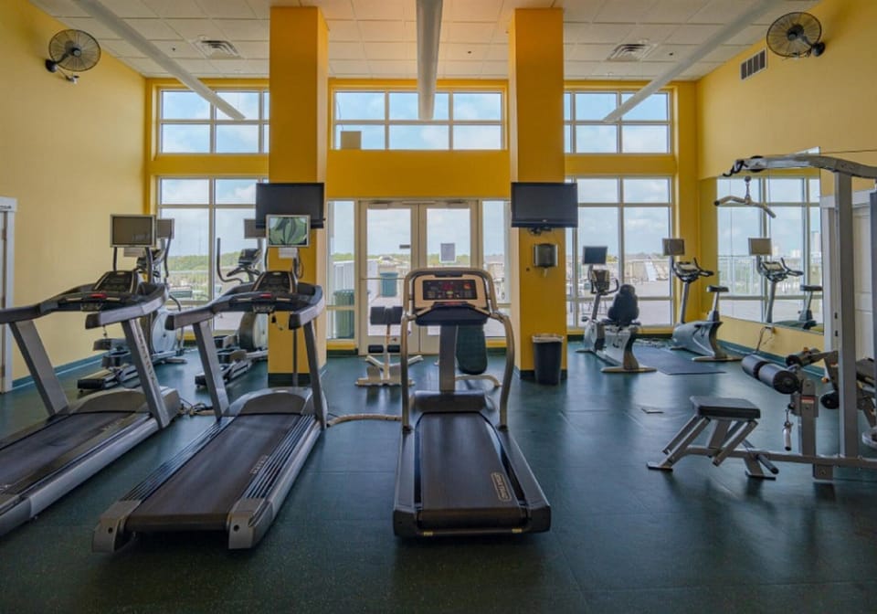 Stay fit during your getaway in this modern fitness center with cardio equipment and strength training options.