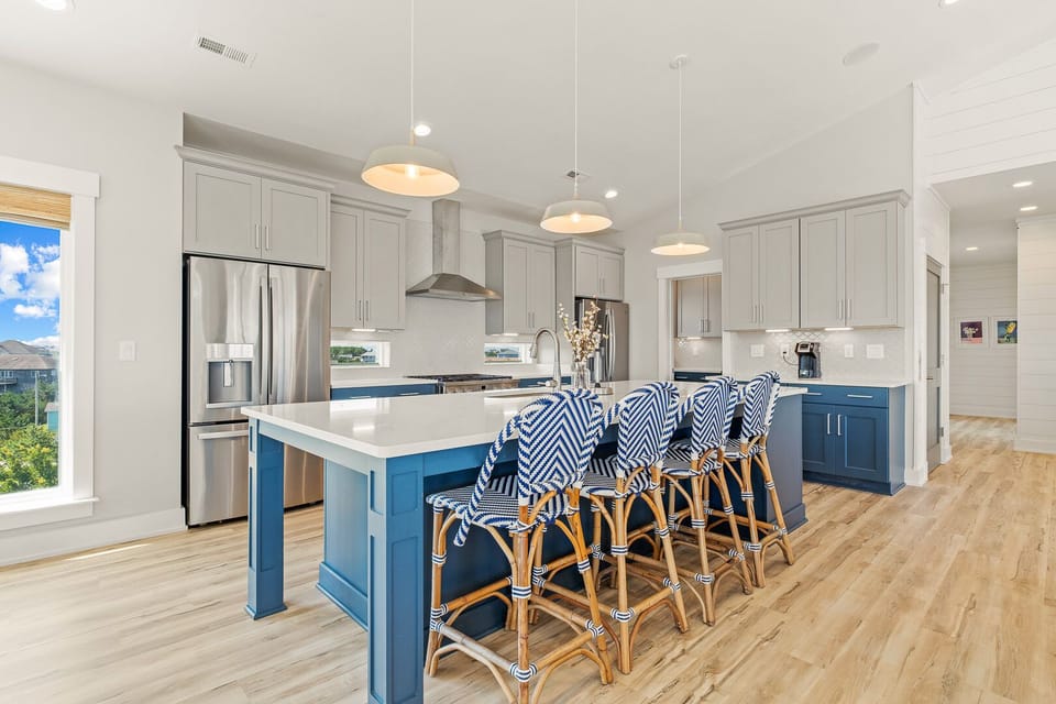 Kitchen with Bar Stool Seating on Third Level