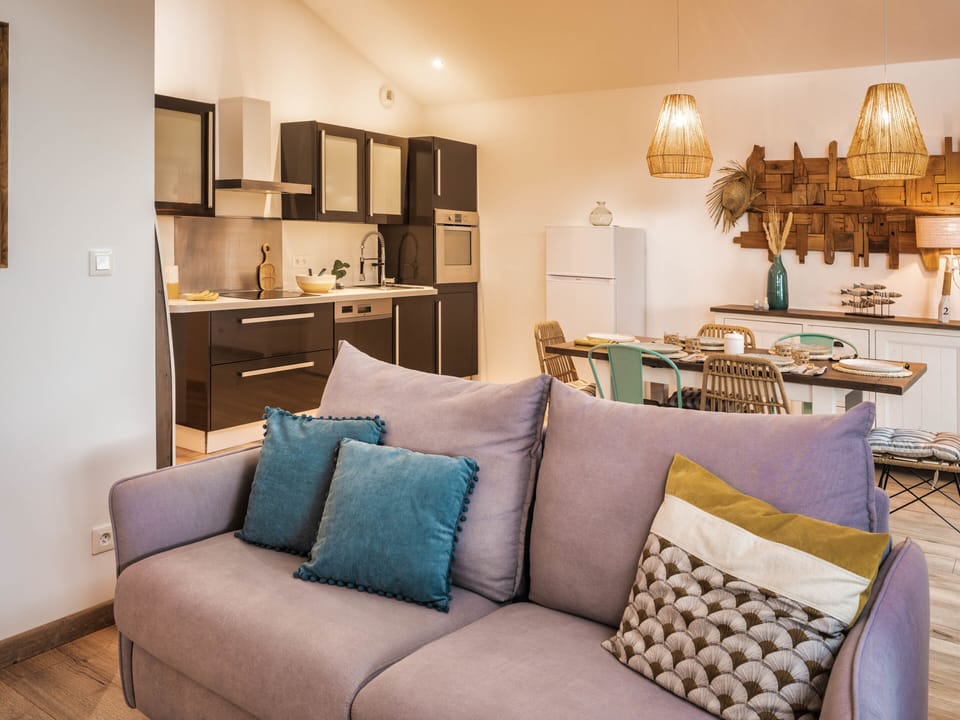 main room opening onto terrace TV lounge area