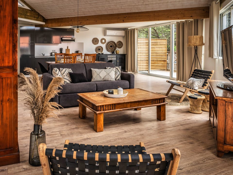 main room opening onto terrace TV lounge area
