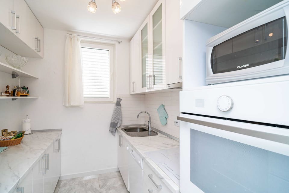 Apartment (Two Bedroom Apartment with Balcony) | Private kitchen | Fridge