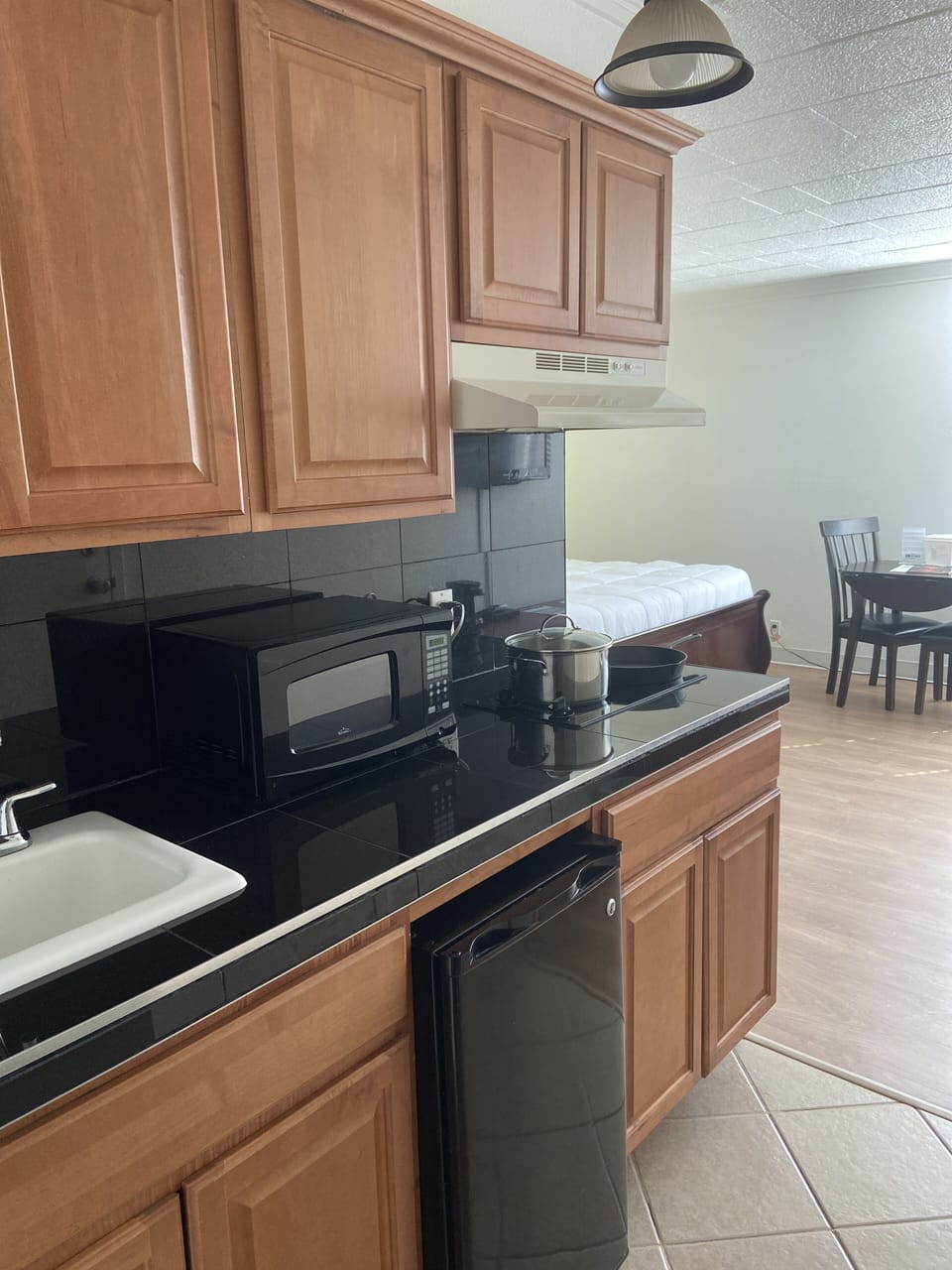 Down comforters, Tempur-Pedic beds, laptop workspace, iron/ironing board