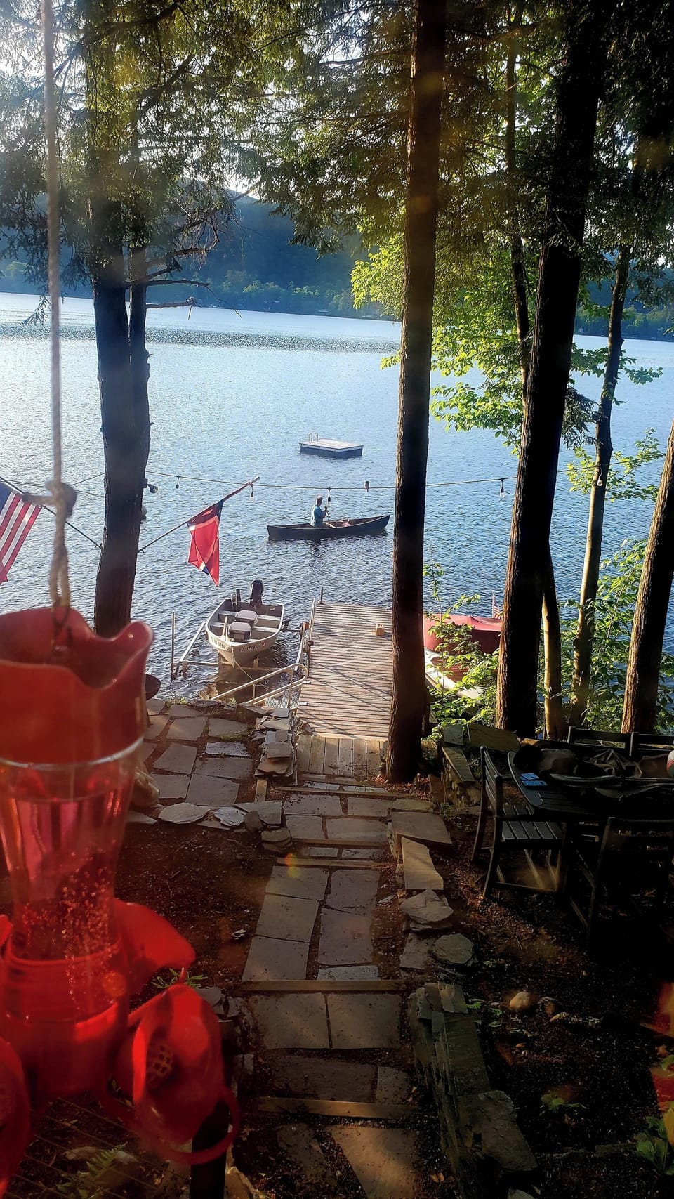 swimming platform and canoe available for use.