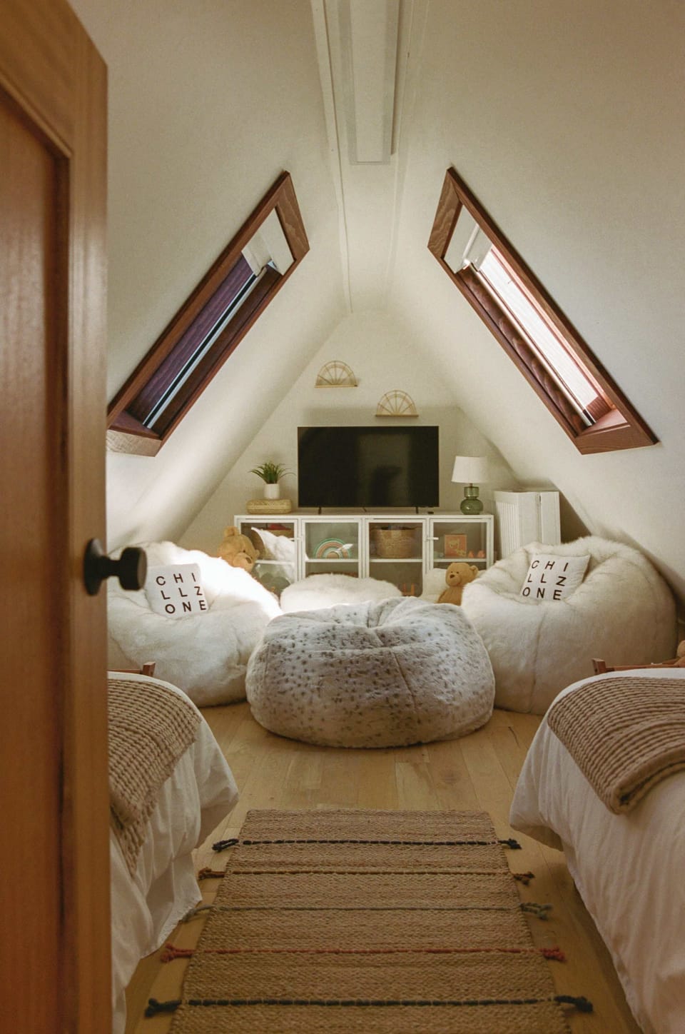 Our playroom boasts two cozy twin beds, making it the perfect space for your little ones' adventures and dreams. ✨