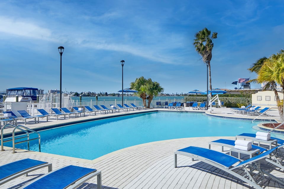 Outdoor pool, pool umbrellas, sun loungers