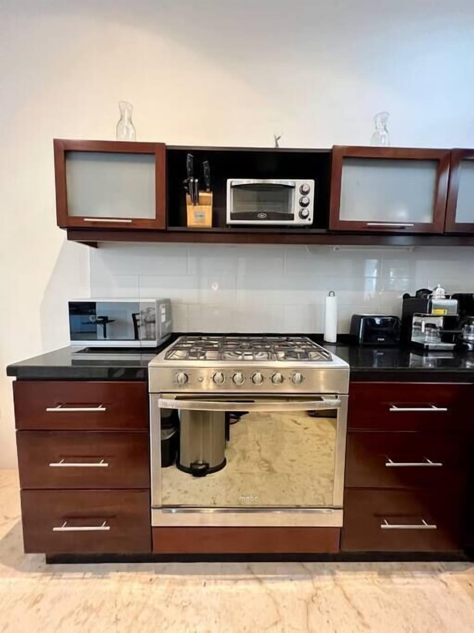 kitchen microwave, small convection oven and large oven/stove