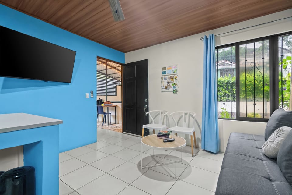 Welcome to our living room with 50"TV and a QRCode to get you logged in quick.