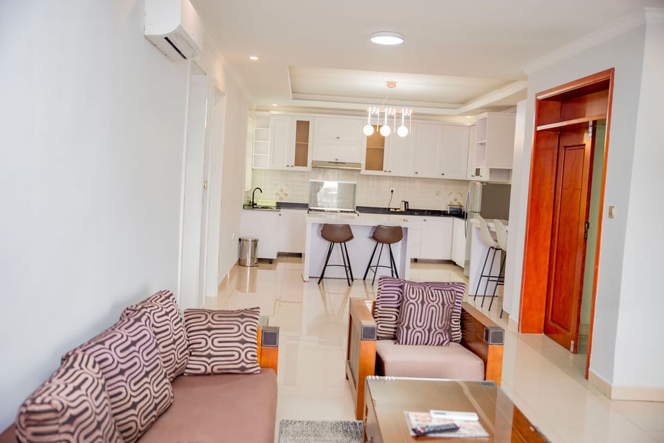 Executive Apartment, 2 Bedrooms | Living area | 42-inch LED TV with satellite channels, TV