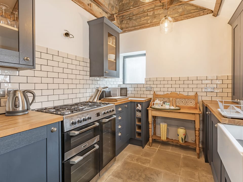 Fridge, electric kettle, toaster, cookware/dishes/utensils
