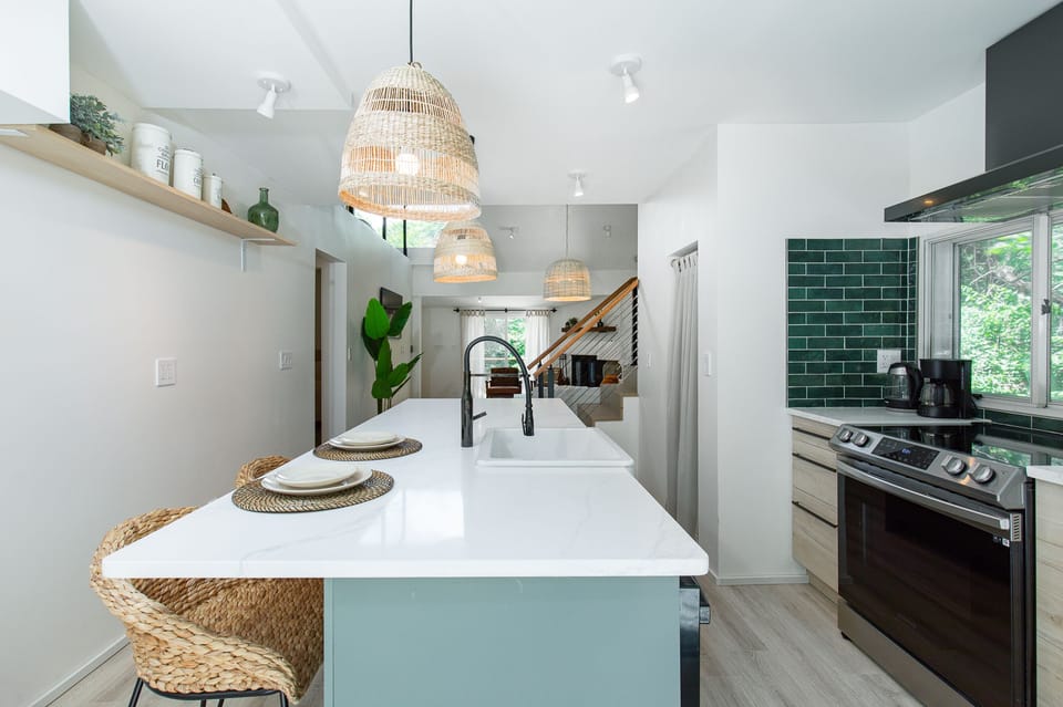 Light and airy kitchen with island seating for two