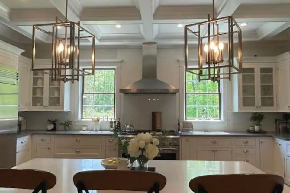 spacious Gourmet Kitchen w/ Commercial Range & fridge, wine cooler, microwave