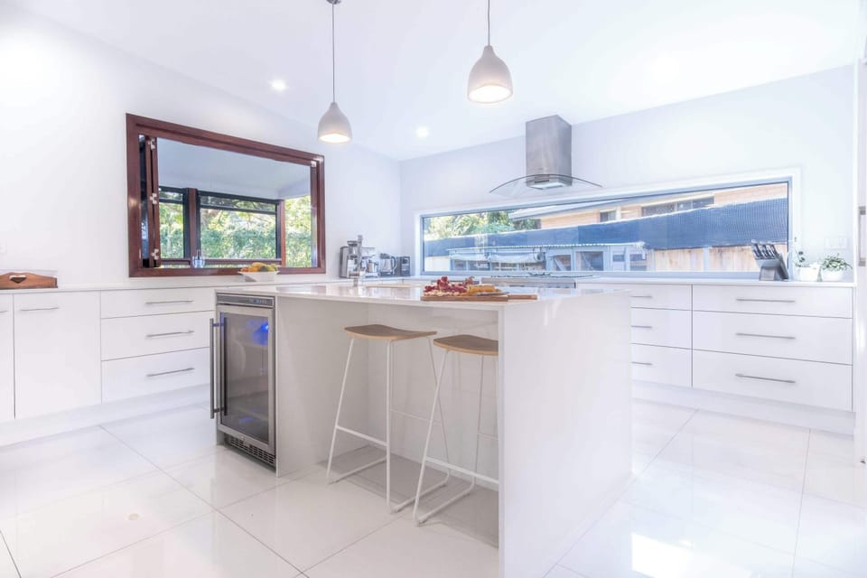 Large kitchen island and breakfast bar.