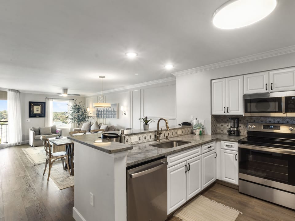 Your gourmet kitchen features modern appliances and marble countertops, perfect for creating memorable meals during your stay.