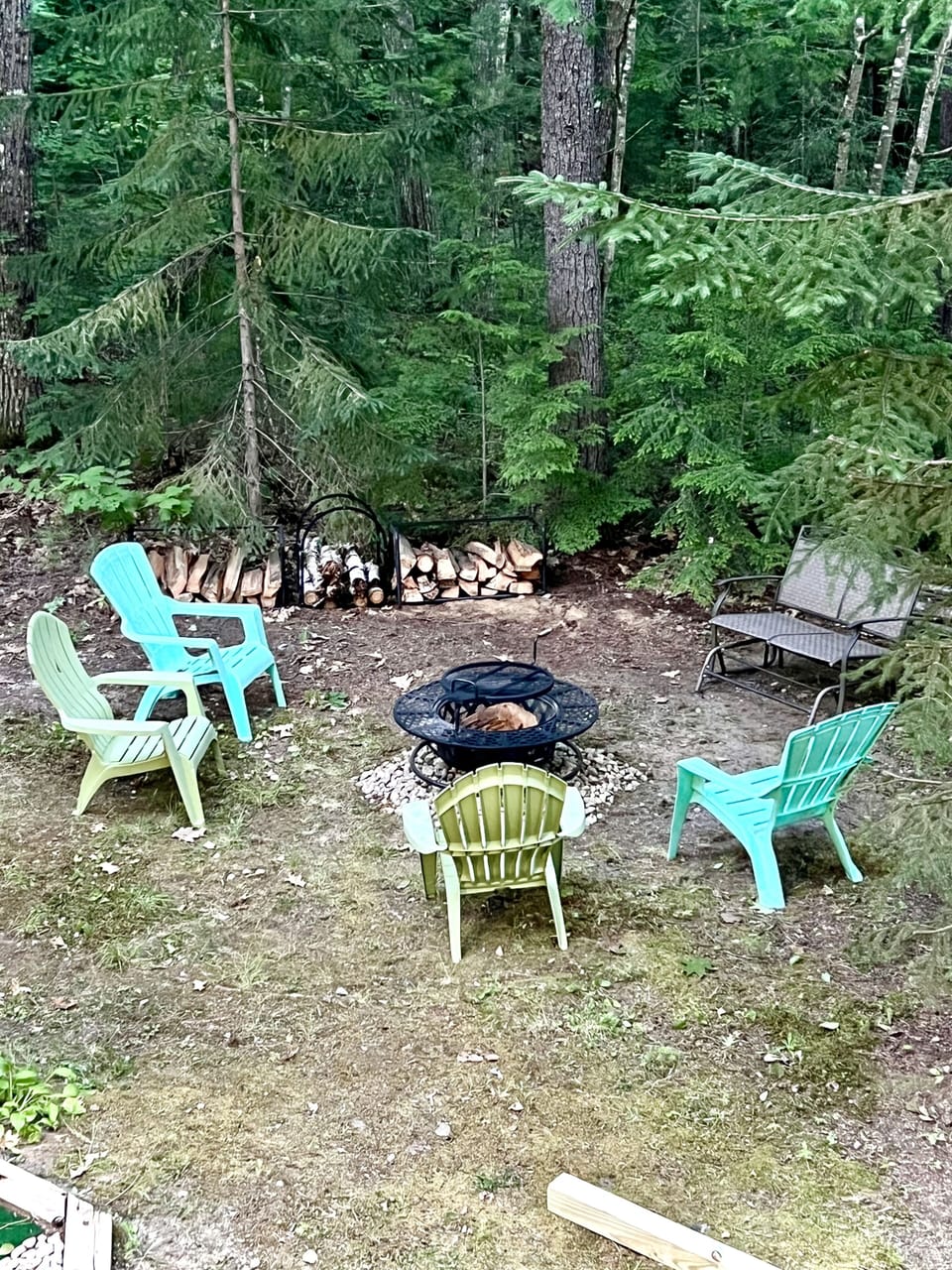 Gather around a large fire pit you can also cook over.